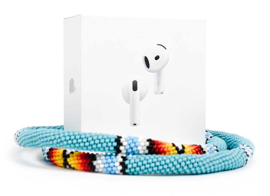 Photo of contest prize: Apple Airpods and an indigenous designed lanyard.